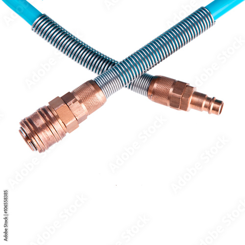 rubber pipes with metal endings isolated on white 