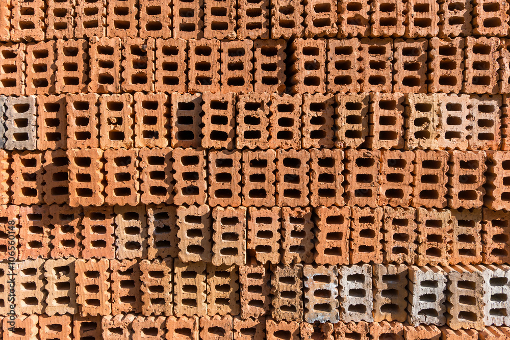 Stack of orange Brick block in residential building construction site Stack of orange Brick block in residential building construction site