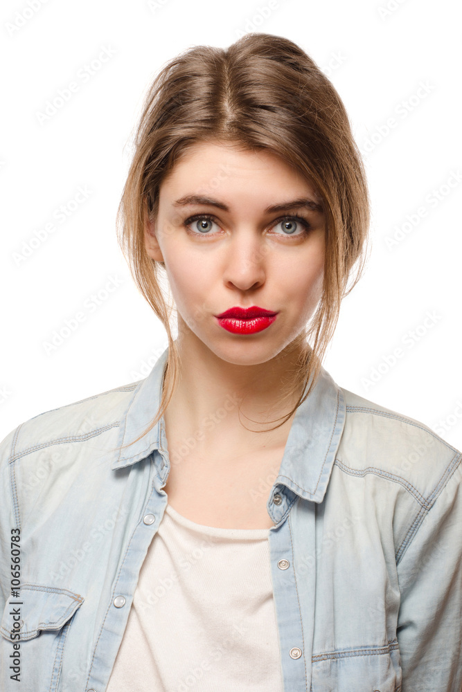 Beautiful stylish young woman with red lips