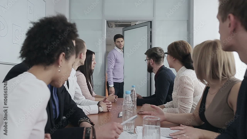 Business people in a conference hall waiting for leader. Slow motion Business people in a conference hall waiting for leader. Slow motion