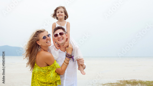 Young family of father, mother and daughter