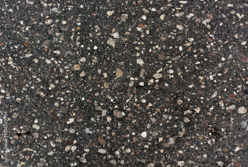 Old gray asphalt surface.