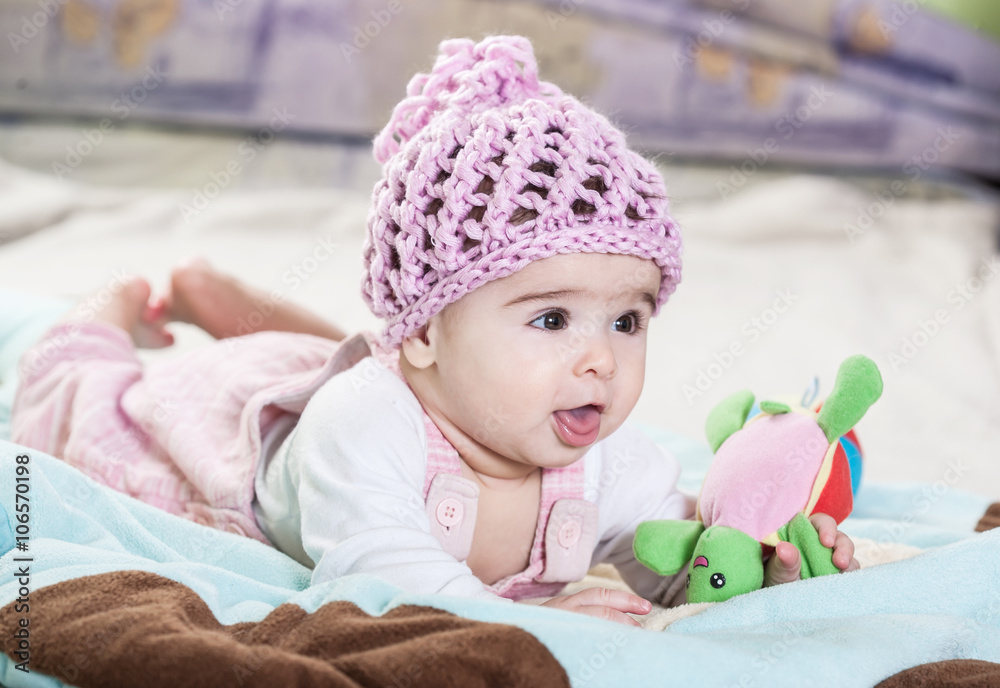 Beautiful newborn baby girl in pink hat. Beautiful newborn baby girl in pink hat.