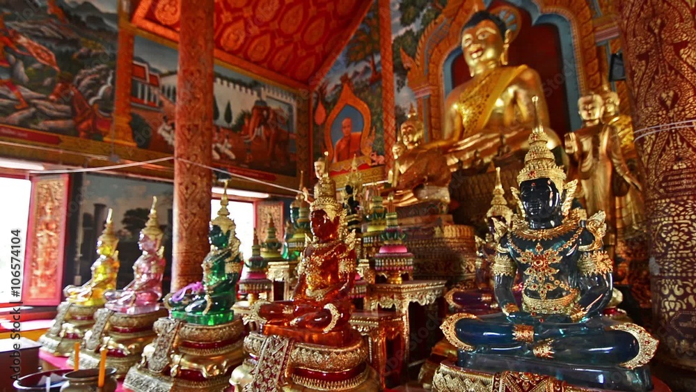Glass buddhas in Wat Thung Yung temple in Chiang Mai. Zoom out Glass buddhas in Wat Thung Yung temple in Chiang Mai. Zoom out