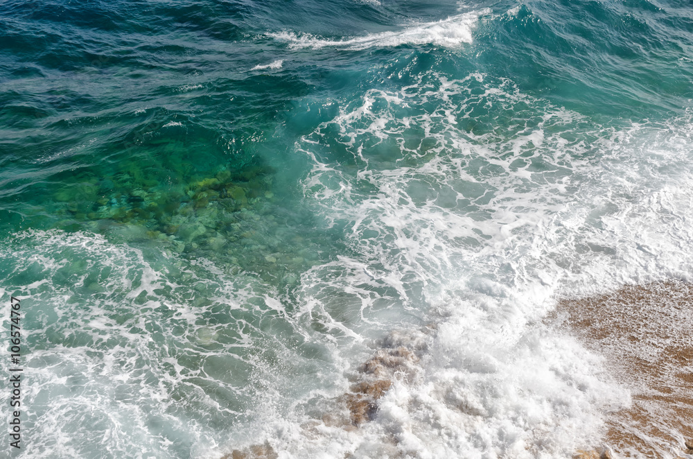 Waves on sand near beach