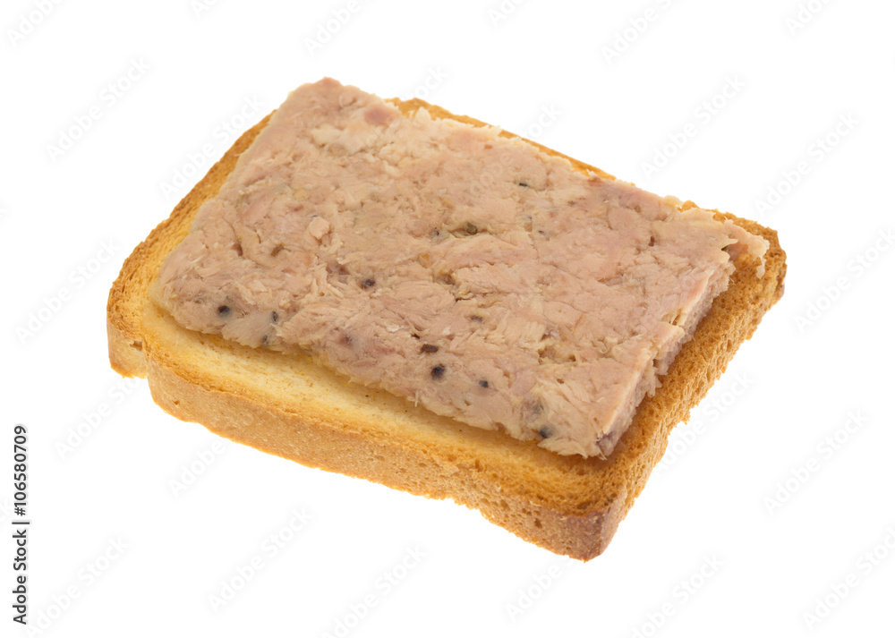 Lemon pepper tuna on hard toast isolated on a white background