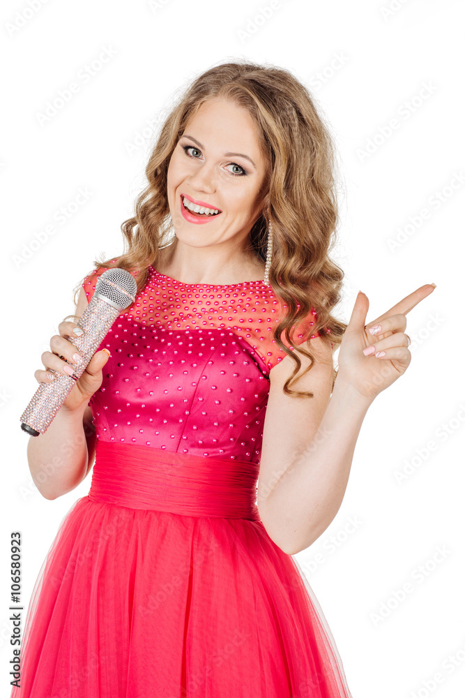 Studio shot beautiful young singing girl in elegant red dress lo Studio shot beautiful young singing girl in elegant red dress lo
