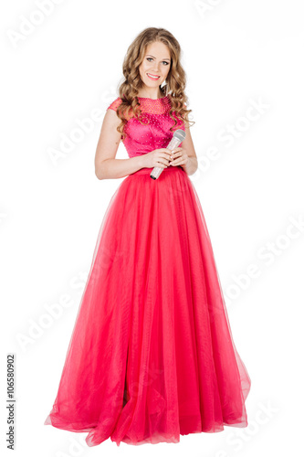 Studio shot beautiful young singing girl in elegant red dress lo
