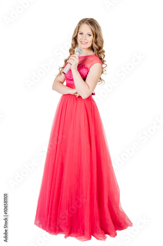 Studio shot beautiful young singing girl in elegant red dress 