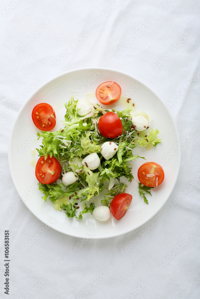 fresh salad on white plate