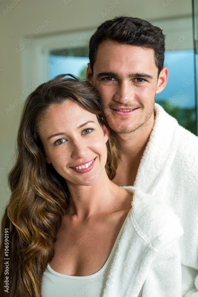 Portrait of young couple embracing Portrait of young couple embracing