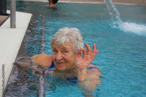 Senior woman swimming in a pool
