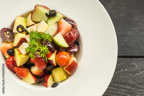 fruits salad in plate on table