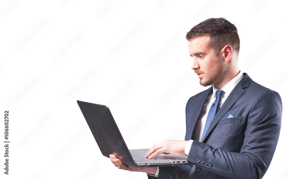 Handsome businessman with a laptop, isolated on white background Handsome businessman with a laptop, isolated on white background