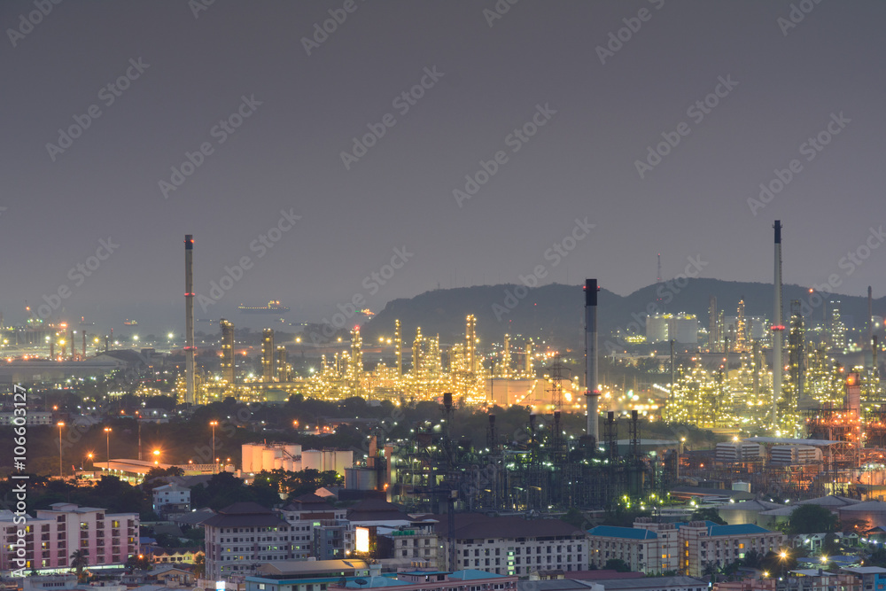 Industrial plant in the city at night time