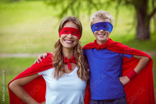 Mother and son pretending to be superhero