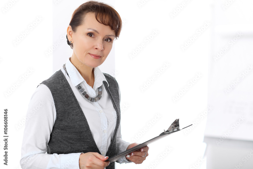 Happy senior businesswoman in office Happy senior businesswoman in office
