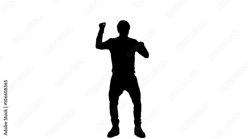Silhouette Of A Boy Dancing In Studio Silhouette Of A Boy Dancing In Studio