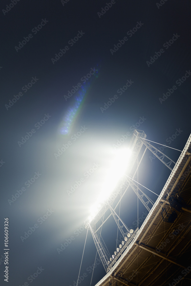 Fototapeta View of stadium lights at night