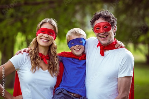 Happy family pretending to be superhero