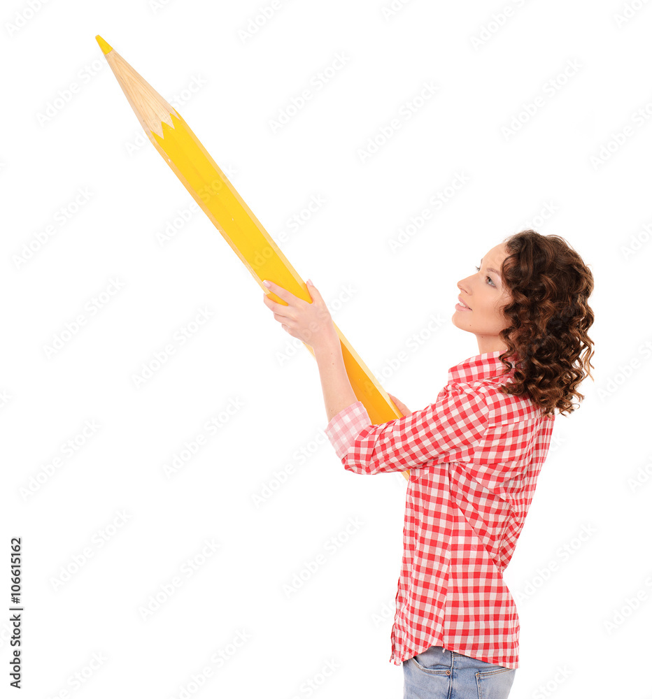 young pretty woman with huge yellow pencil young pretty woman with huge yellow pencil