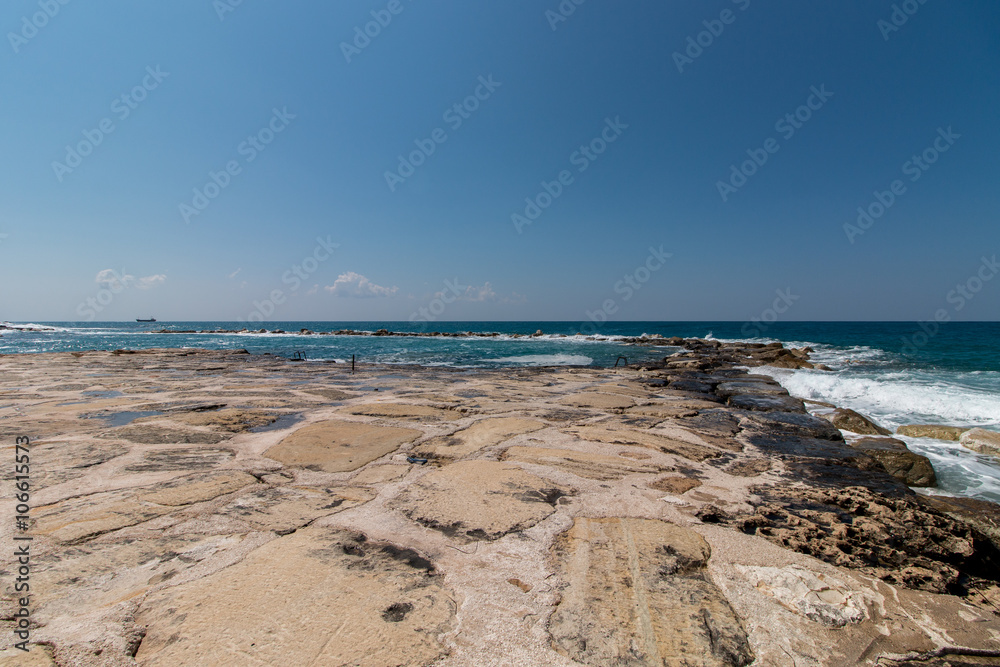 Ocean coastline with small waves Ocean coastline with small waves