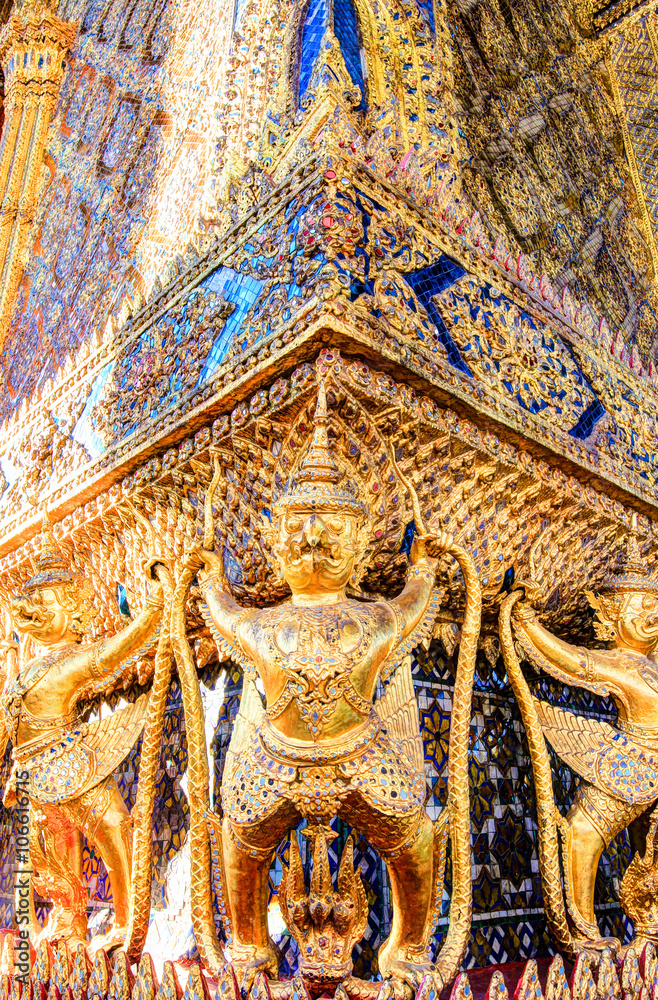 Golden statue inside public royal temple