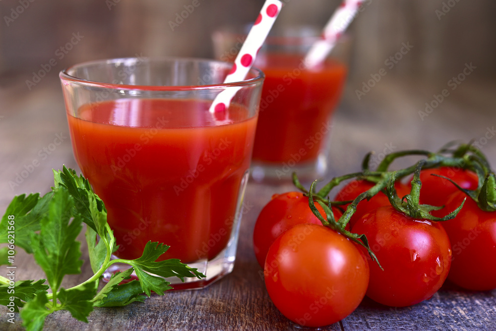 Fresh tomato juice in a glass. Fresh tomato juice in a glass.