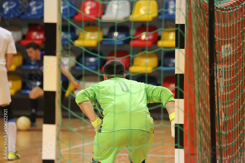 Rear view of futsal goalkeeper