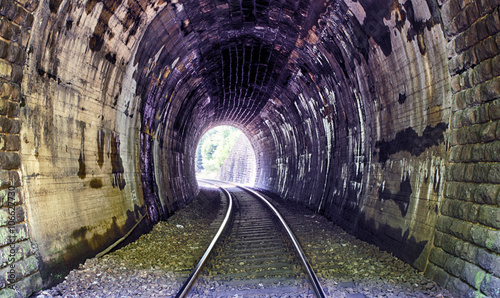 Train tunnel with railway - old