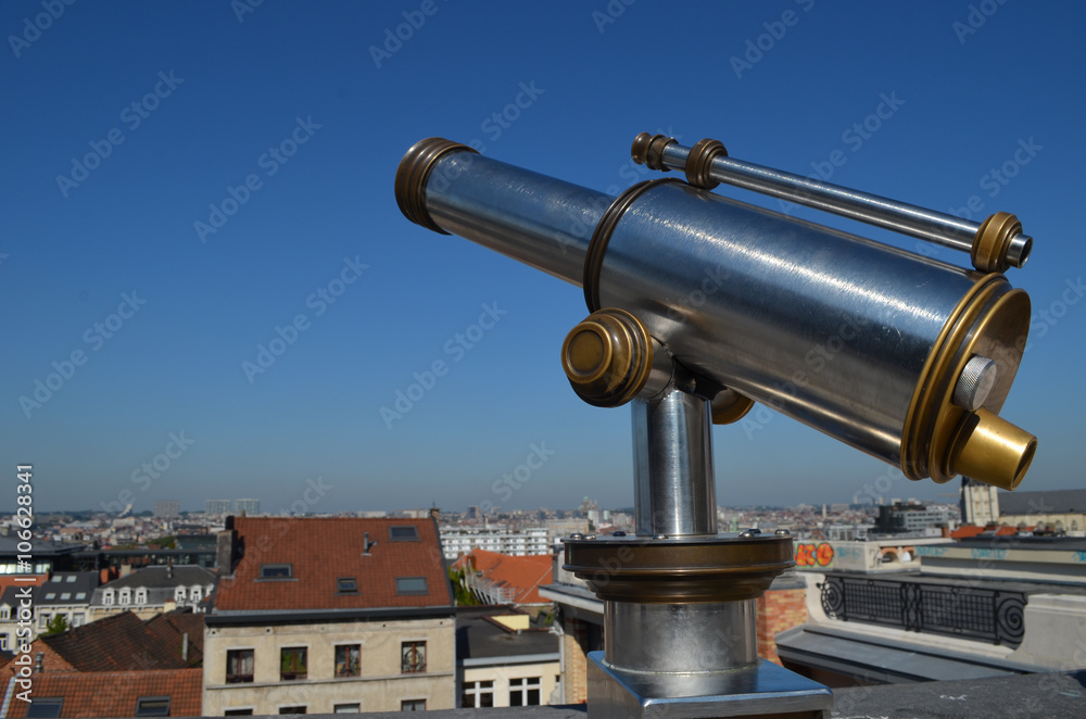 Touristic telescope with rooftop view of Brussels in the Minims street