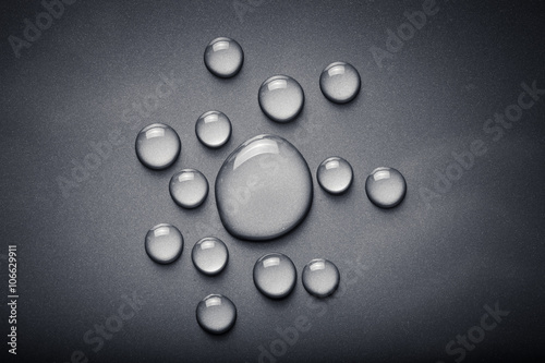 Dops of water on a color background. Gray. Toned