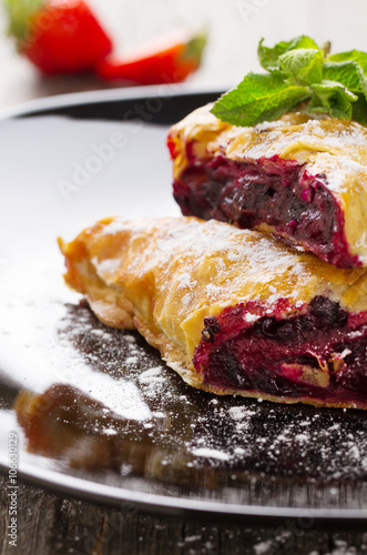 Strudel with blackberry close-up