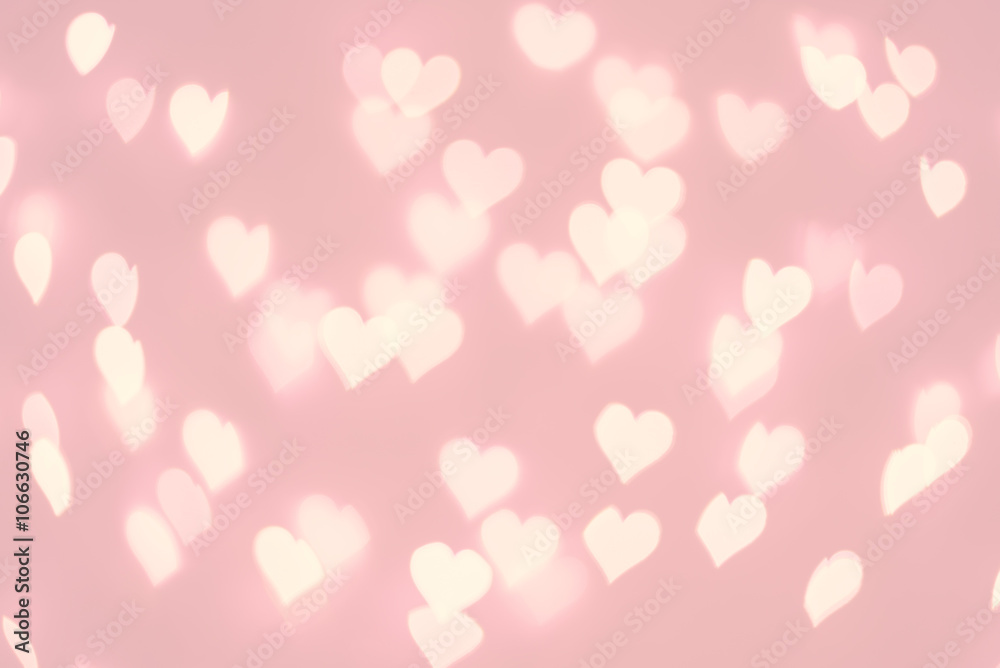 Heart bokeh background. Pastel pink color blurred texture