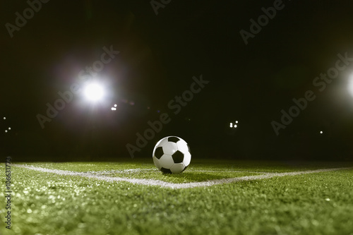 Soccer ball on sports field