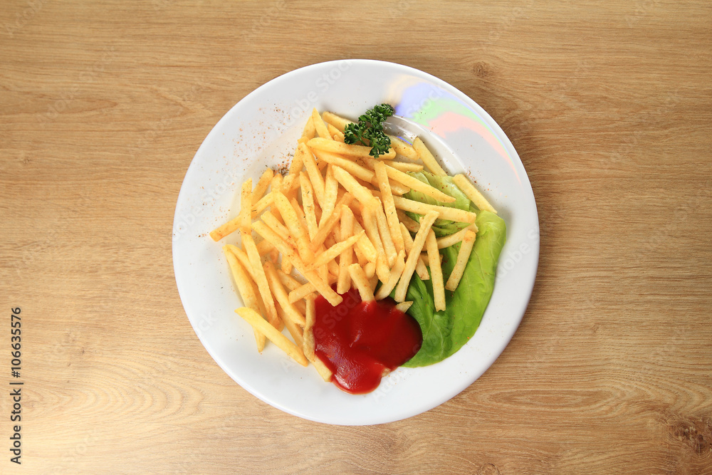 fried potatoes and sauce on a white plate fried potatoes and sauce on a white plate