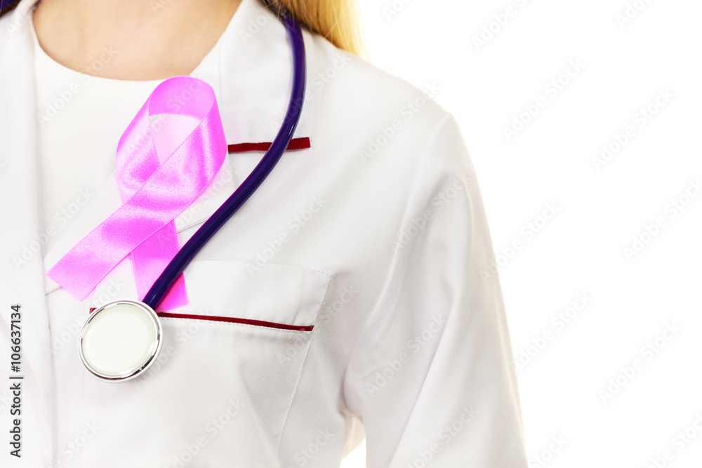 Doctor with pink cancer ribbon aids symbol on chest Doctor with pink cancer ribbon aids symbol on chest