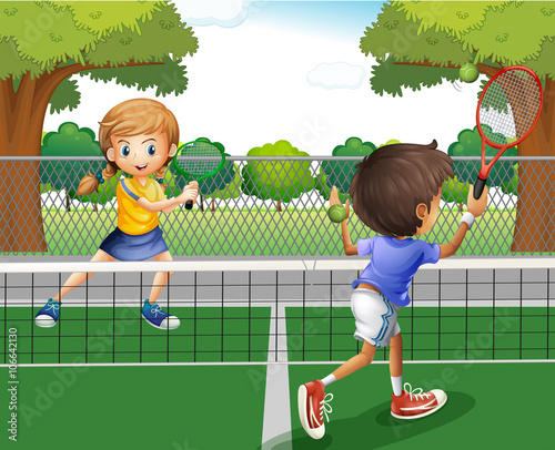 Boy and girl playing tennis in the park