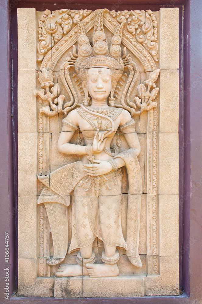 Carving of Hindu god Vishnu standing with