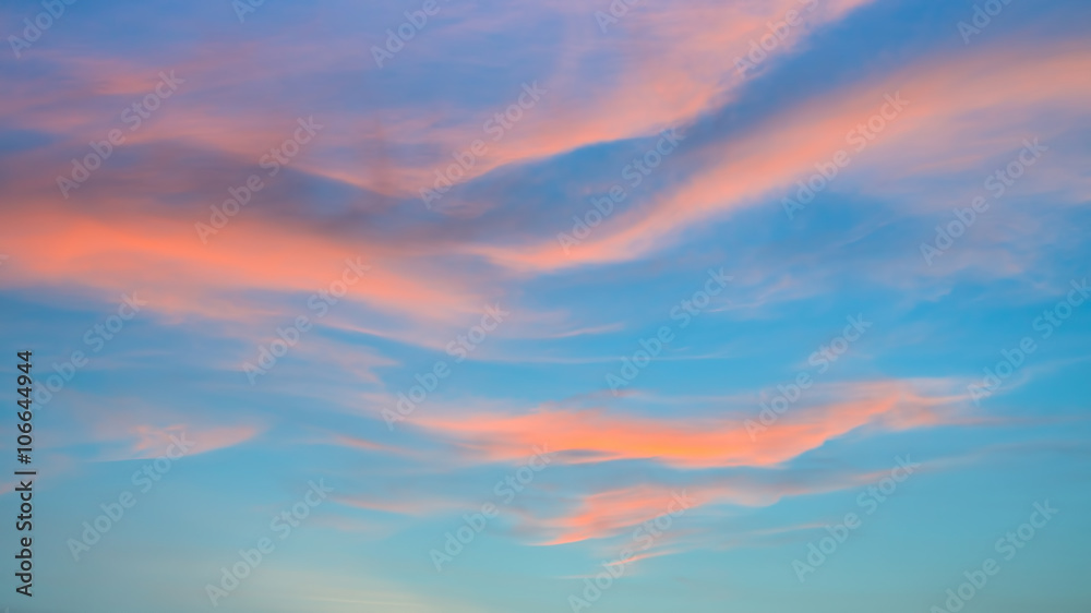 Blue sky with clouds during sunset.