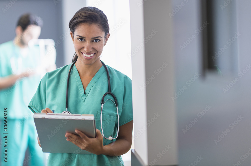 Hispanic nurse working in hospital Hispanic nurse working in hospital
