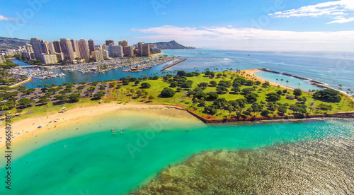 Aerial view of Magic Island Beach Park, Waikiki hotels, and Diamond Head