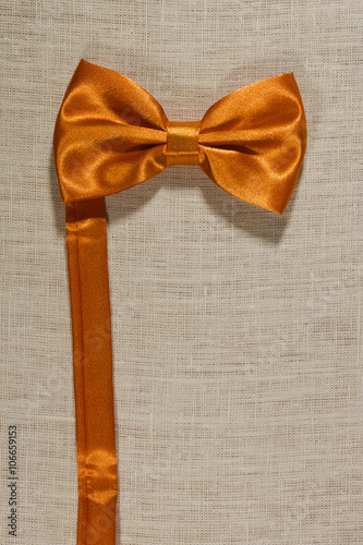 Bow tie on a linen napkin photo