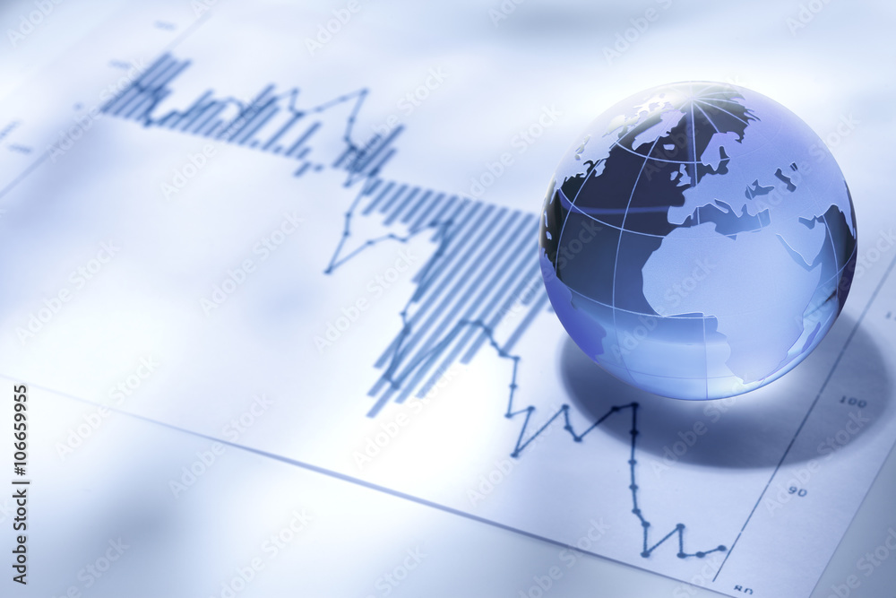 Fototapeta premium グローバルビジネス/ガラス製の地球とファイナンシャルチャート