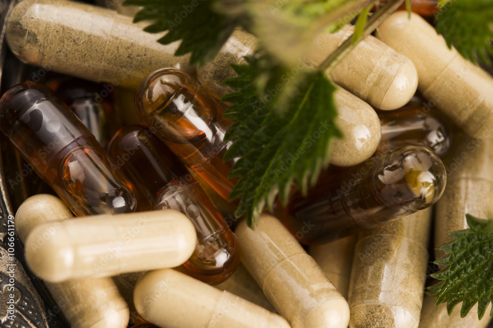 pills with herbs, macro