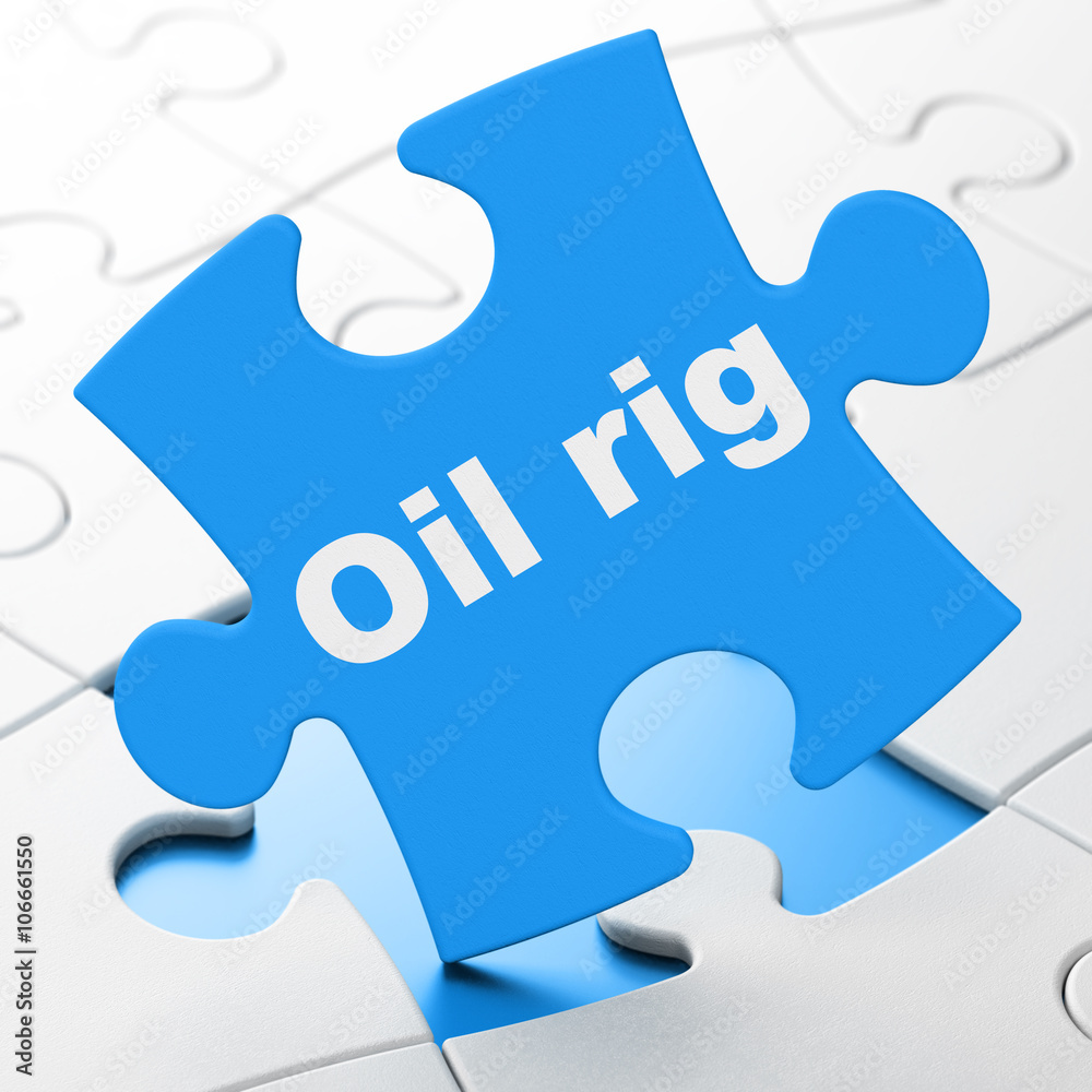 Manufacuring concept: Oil Rig on puzzle background