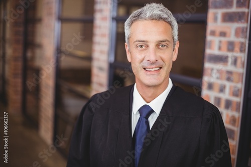 Tablou canvas Portrait of happy male lawyer in office
