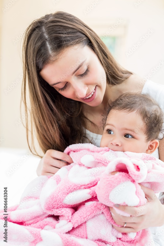 Happy mother and baby with blanket Happy mother and baby with blanket