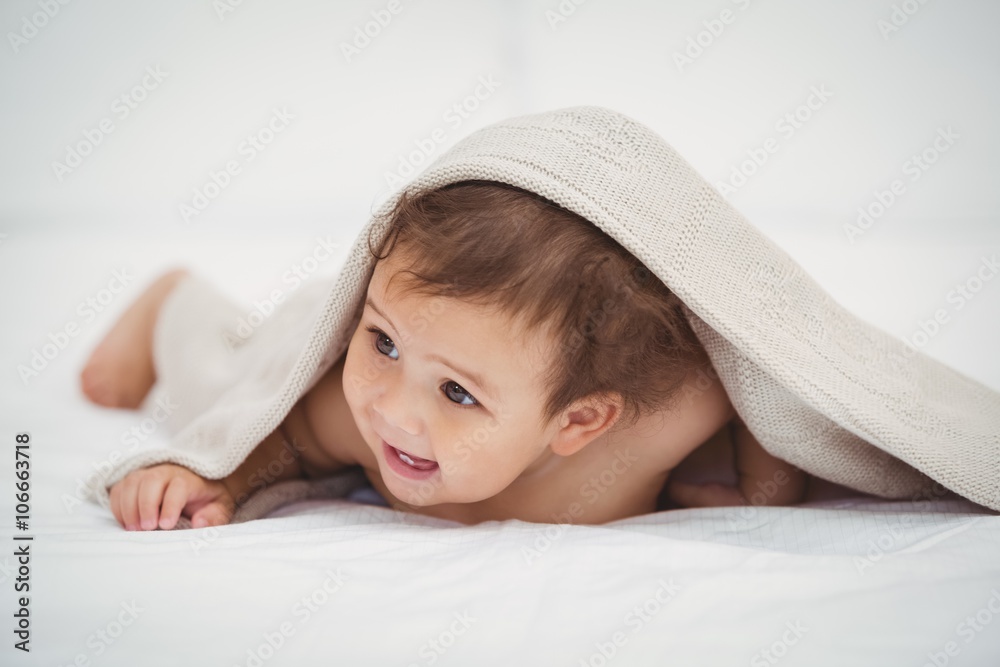 Cute baby lying under blanket Cute baby lying under blanket
