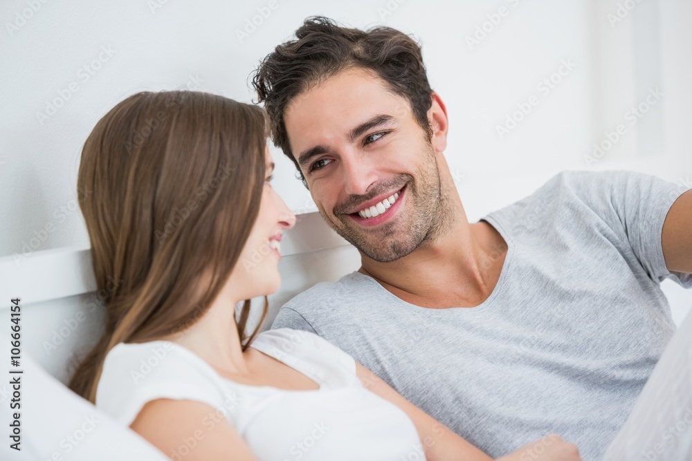 Romantic couple resting on bed